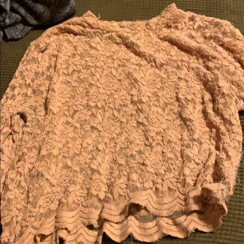 Pink lace shirt. Charlotte Russe and it’s a size L